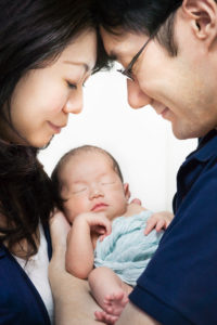 A10-day old Japanese newborn baby girl and parents